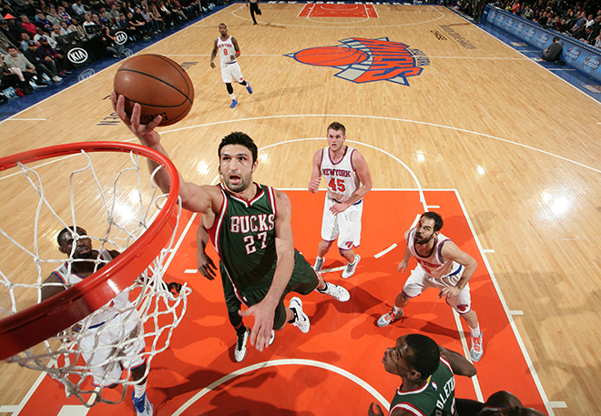 NEW YORK, NY - JANUARY 4: Zaza Pachulia #27 of the Milwaukee Bucks goes for a lay up against the New York Knicks during the game on January 4, 2015 at Madison Square Garden in New York, New York. NOTE TO USER: User expressly acknowledges and agrees that, by downloading and or using this Photograph, user is consenting to the terms and conditions of the Getty Images License Agreement. Mandatory Copyright Notice: Copyright 2015 NBAE (Photo by Nathaniel Butler/NBAE via Getty Images)
